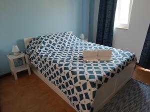 Ένα ή περισσότερα κρεβάτια σε δωμάτιο στο Casa Pelourinho