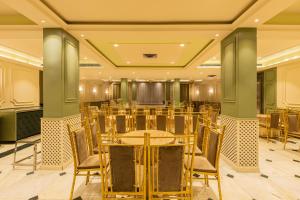 a conference room with a table and chairs at Hotel Kamal Palace in Jalandhar