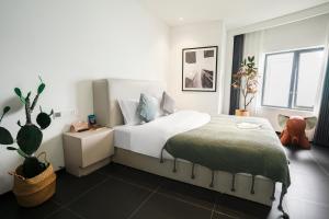 Voodi või voodid majutusasutuse Time Wharf Hotel - Jiefangbei Shibati Branch toas