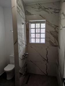 Kúpeľňa v ubytovaní Hermes Comfort