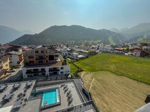 a view of a city with mountains in the background at A CASA Infinity in Serfaus