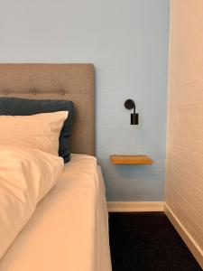 Voodi või voodid majutusasutuse Hotel Birksø toas