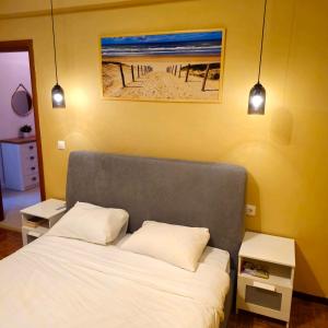 Katil atau katil-katil dalam bilik di Kavala Panorama View Apartment