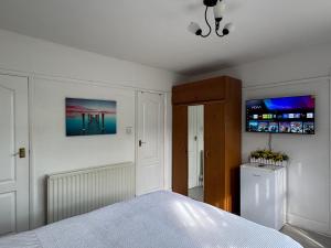 Ένα ή περισσότερα κρεβάτια σε δωμάτιο στο Studio-like room with own entrance