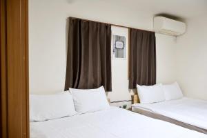 Katil atau katil-katil dalam bilik di 京都東福寺鴨川沿いGuest house Kyoan private room貸切独立卫浴鸭川旁边多人一起入住划算