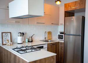 Dapur atau dapur kecil di OftenFlats Stylish Apartments by HolidayKeys