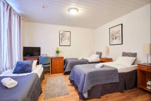 Voodi või voodid majutusasutuse Hotel Hight le mount toas