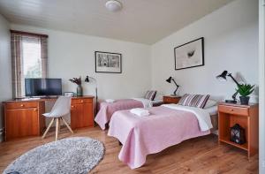 Voodi või voodid majutusasutuse Hotel Hight le mount toas