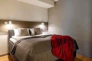 Postel nebo postele na pokoji v ubytování Hessnery Hotel