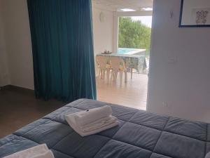 Postel nebo postele na pokoji v ubytování Deep Sea Residence
