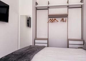 Postel nebo postele na pokoji v ubytování Hotel Vienna