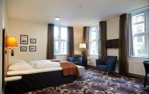 Postel nebo postele na pokoji v ubytování Hotel MDF TELA Near IGI Airport Delhi