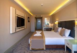 Postel nebo postele na pokoji v ubytování Hotel MDF TELA Near IGI Airport Delhi