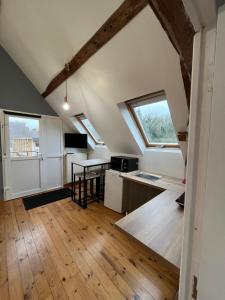 Kuchyň nebo kuchyňský kout v ubytování Logement entier avec accès privé + 4 fotografie