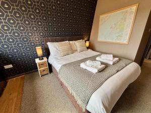The Hebridean - Rooms & Apartments客房内的一张或多张床位