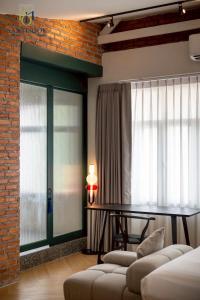 Postel nebo postele na pokoji v ubytování Santisookmidtown Pattani