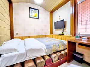Letto o letti in una camera di A deer has you INN near by Tianmen Shan