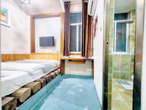 Letto o letti in una camera di A deer has you INN near by Tianmen Shan