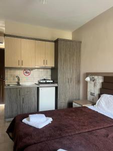 Kuchyň nebo kuchyňský kout v ubytování SUNSET HOTEL + 31 fotografií