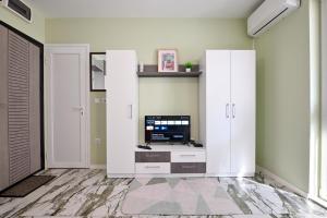 TV/trung tâm giải trí tại Mint Funny Condo