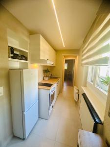 Köök või kööginurk majutusasutuses Modern and cozy studio