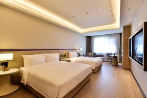 Sjónvarps- og/eða afþreyingartæki á Xi'an Jinling Purple Mountain Hotel