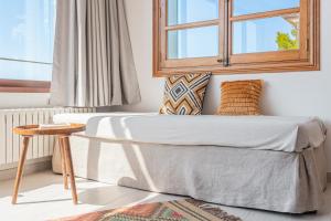Postel nebo postele na pokoji v ubytování Casa del Puerto