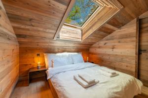 Postel nebo postele na pokoji v ubytování Chalet Plalessu - Latitude Champéry