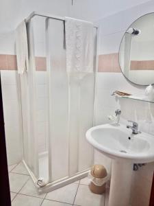 Koupelna v ubytování Hotel Alizé