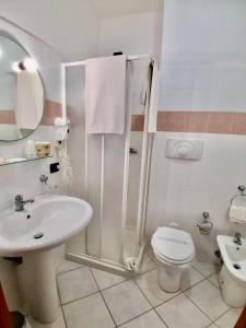 Koupelna v ubytování Hotel Alizé