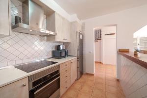 Kuchyň nebo kuchyňský kout v ubytování Casa GOLDI by Mallorca Villa Selection