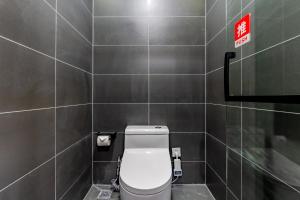 Koupelna v ubytování 黄山吉至黟山云精品酒店 宏村店