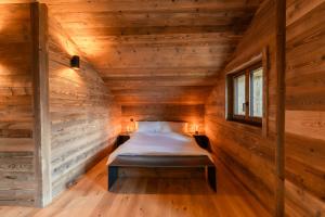 Postel nebo postele na pokoji v ubytování Chalet Plalessu - Latitude Champéry