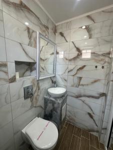 A bathroom at Dracena Guesthouse