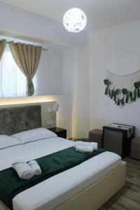 Katil atau katil-katil dalam bilik di Guest House Adi Hoxha