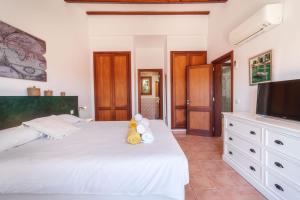 Postel nebo postele na pokoji v ubytování Casa GOLDI by Mallorca Villa Selection