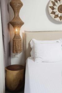 Postel nebo postele na pokoji v ubytování Petra Luxury Suites