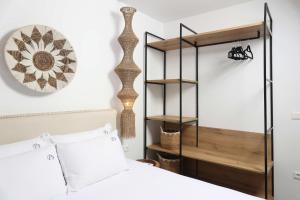 Postel nebo postele na pokoji v ubytování Petra Luxury Suites