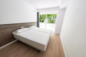 Posteľ alebo postele v izbe v ubytovaní Park Suites Family Rentalmar