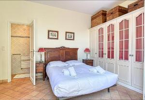 Cama o camas de una habitación en L'ORANGER maison pittoresque et confortable proche des plages, Croisette et centre-ville