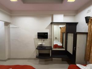 TV a/nebo společenská místnost v ubytování Hotel Temple Sai + 37 fotografií