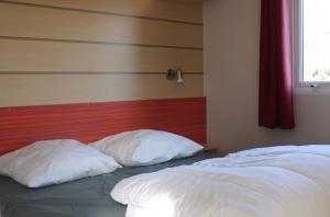Postel nebo postele na pokoji v ubytování Camping Le Balcon de Chartreuse