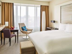 Postel nebo postele na pokoji v ubytování Sofitel Brussels Europe