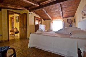 Postel nebo postele na pokoji v ubytování Bed and Breakfast Tenuta Palmieri ONLY ADULT