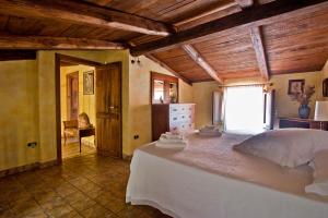 Postel nebo postele na pokoji v ubytování Bed and Breakfast Tenuta Palmieri ONLY ADULT