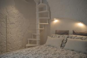 Letto o letti in una camera di G.H.03 Polignano a Mare