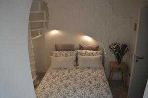 Letto o letti in una camera di G.H.03 Polignano a Mare