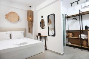 Postel nebo postele na pokoji v ubytování Petra Luxury Suites