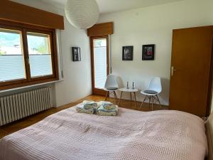Postel nebo postele na pokoji v ubytování Chain & Chill + 3 fotografie