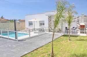 a view of a villa with a swimming pool at El Rincon de Samuel in Conil de la Frontera